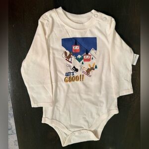 NET 6-9 months Cream Baby Onesie with Skiing Print